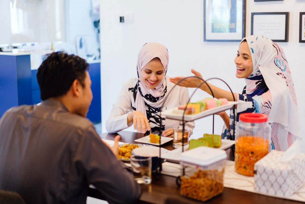 family eating together and laughing